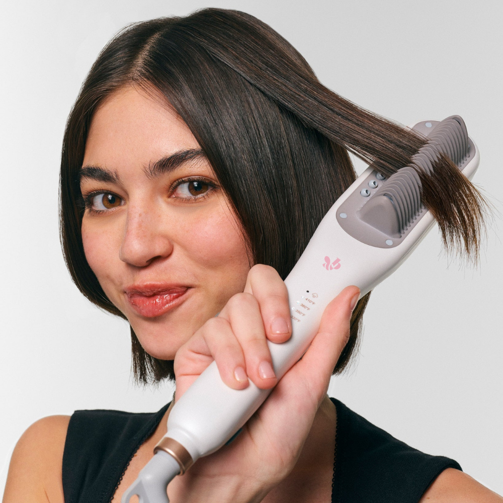 Steam infused permanent straightening brush