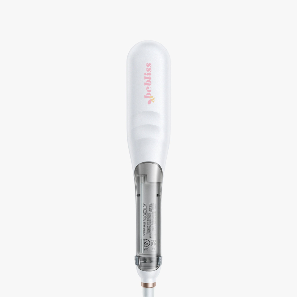 Steam infused permanent straightening brush